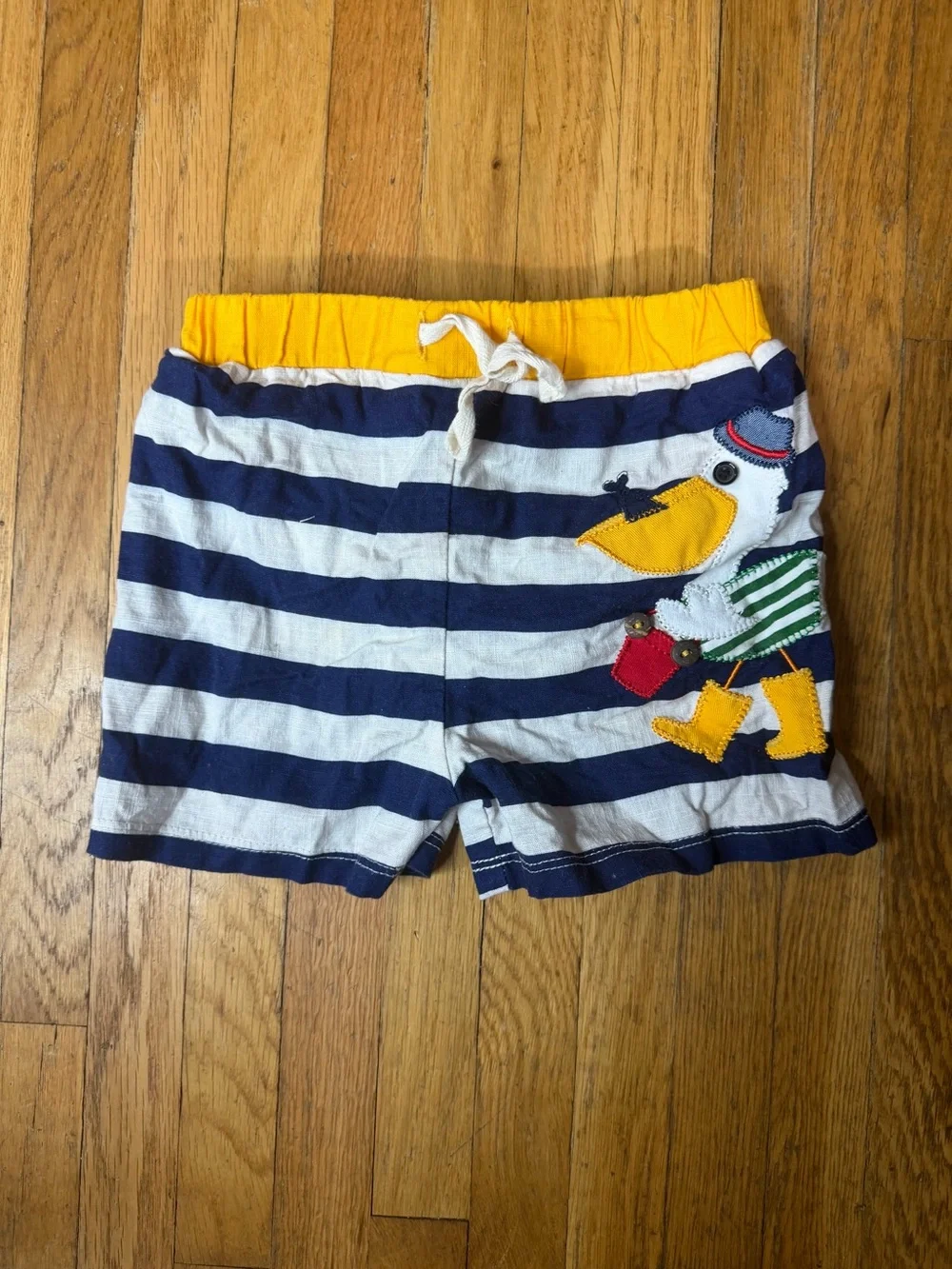 Mudpie 9/12M Pelican Embroidered Swim Trunks
